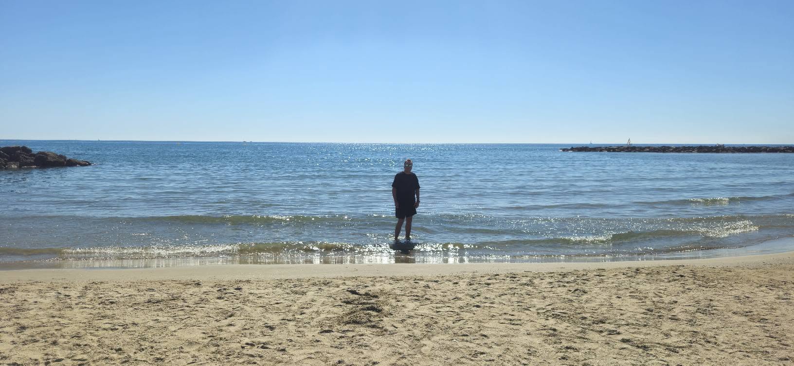 Nicholas standing in Mediterranean seawater