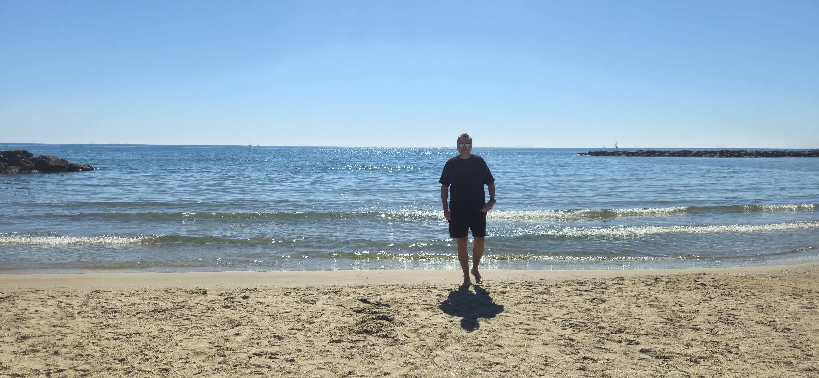 Nicholas on a Mediterranean beach