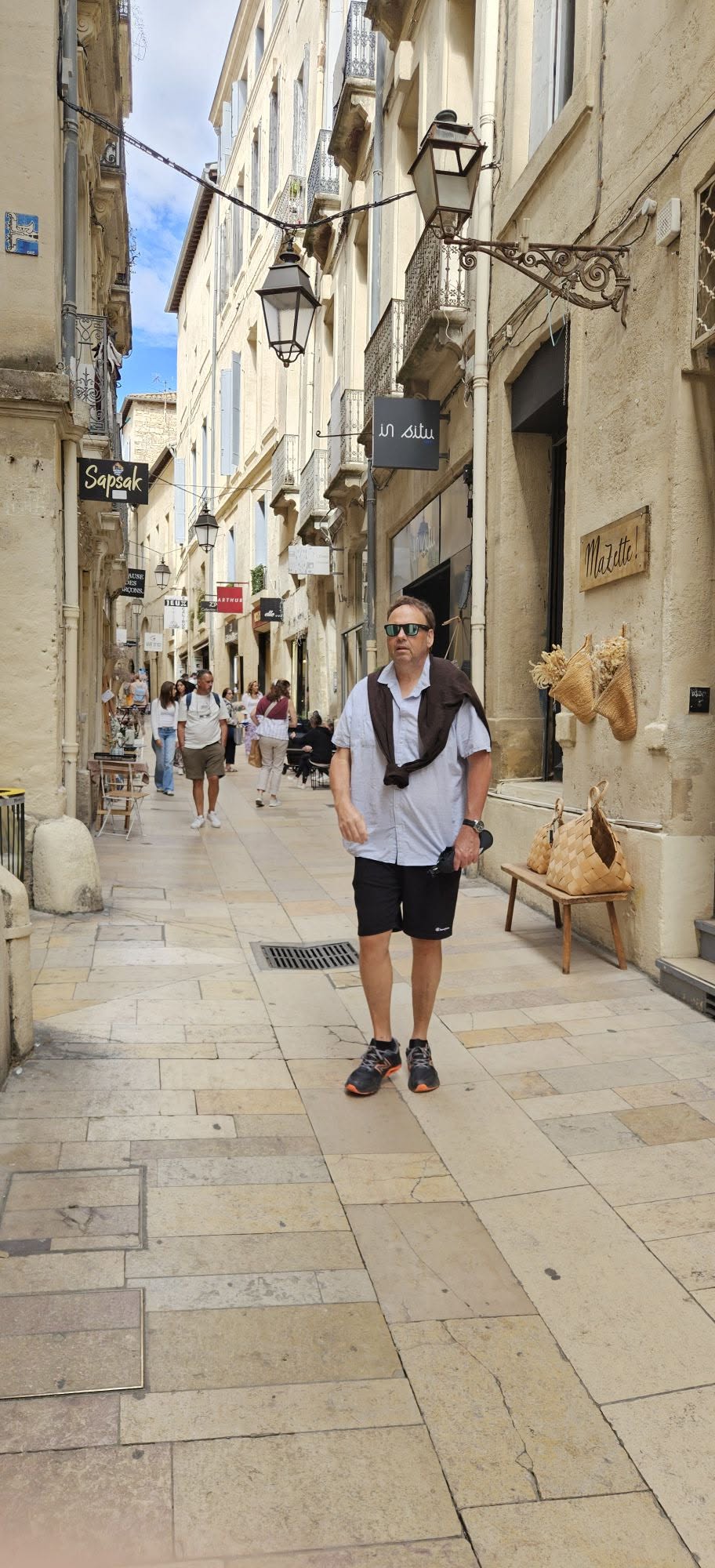 Nicholas exploring a charming pedestrian street in southern France