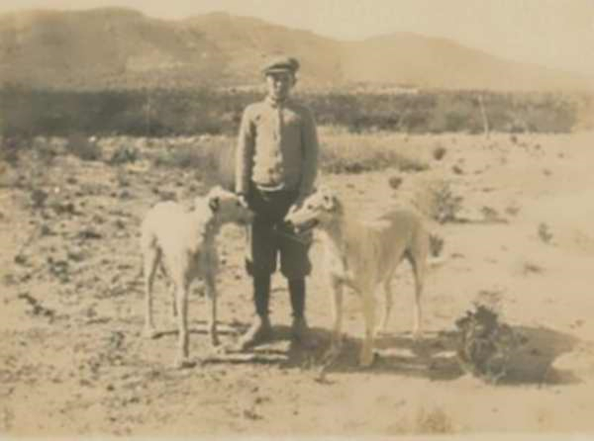 Boy with two Ranch Hounds