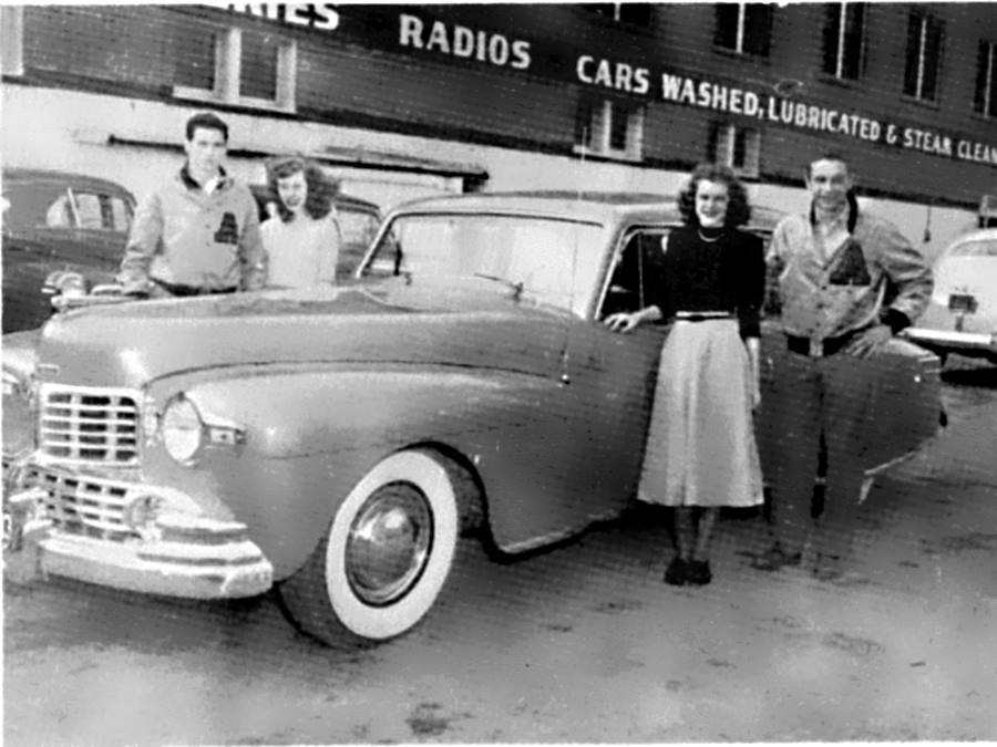 Four Abilene High School Students pose beside car in 1948