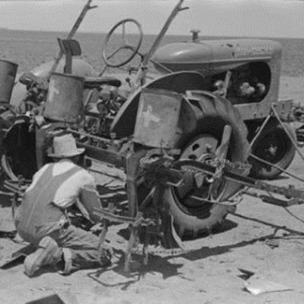 Making the Final Adjustments to Planter in 1939