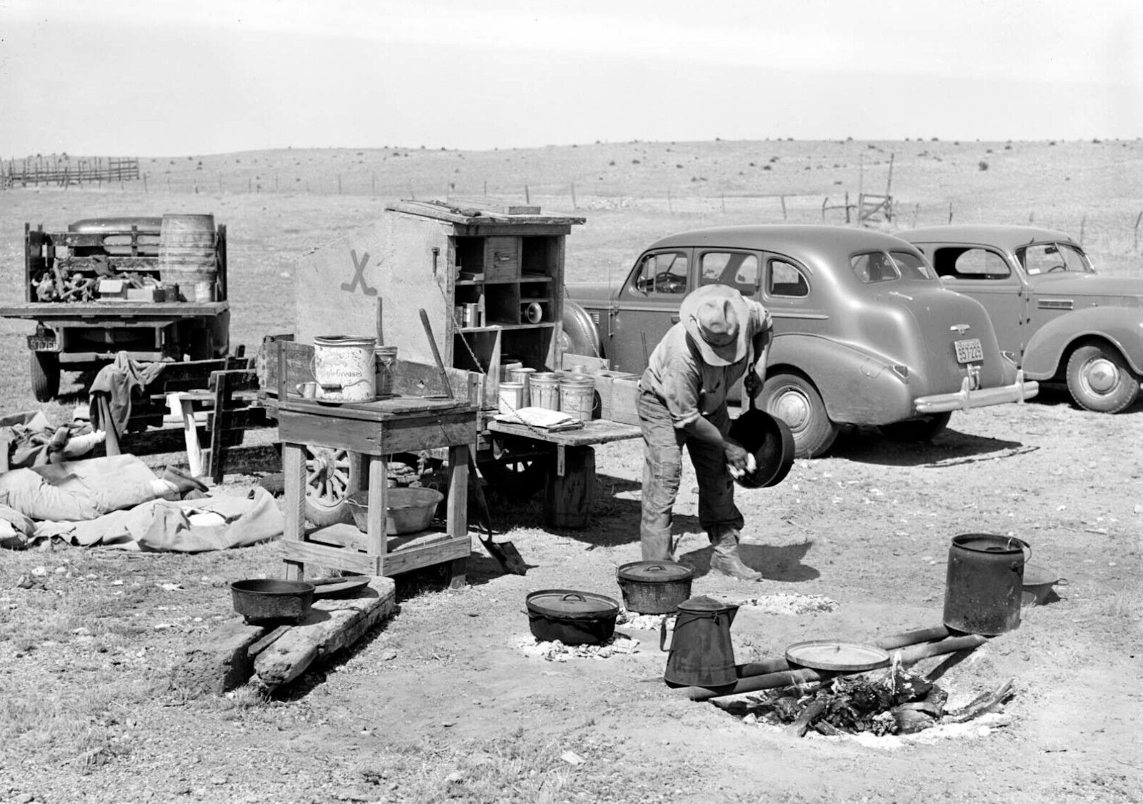 Cowboy Camp Cook Cleaning Up