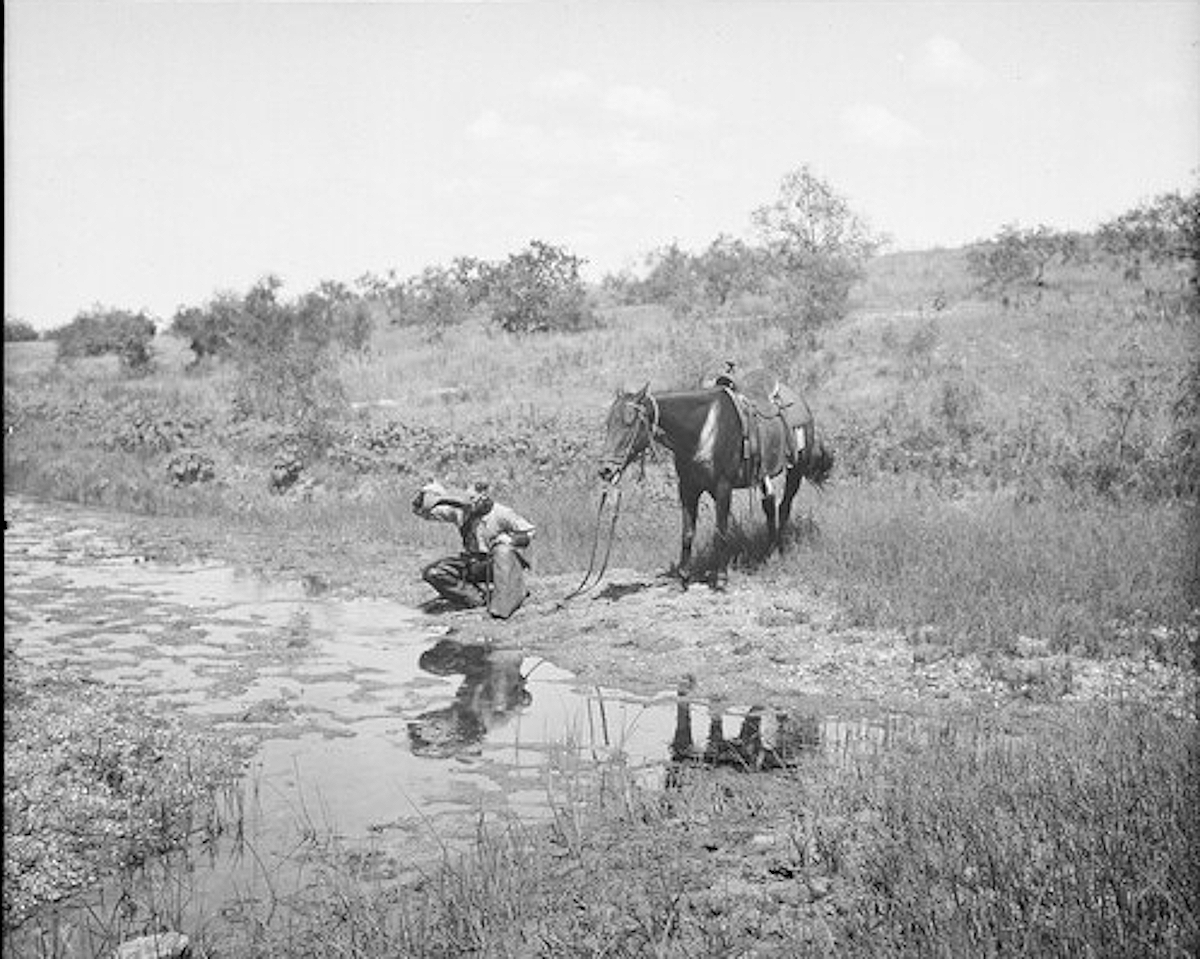 Drinking from Brim of His Hat