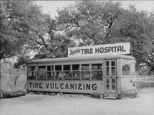 Old streetcar made into tire shop. Kerrville, Tx 1939
