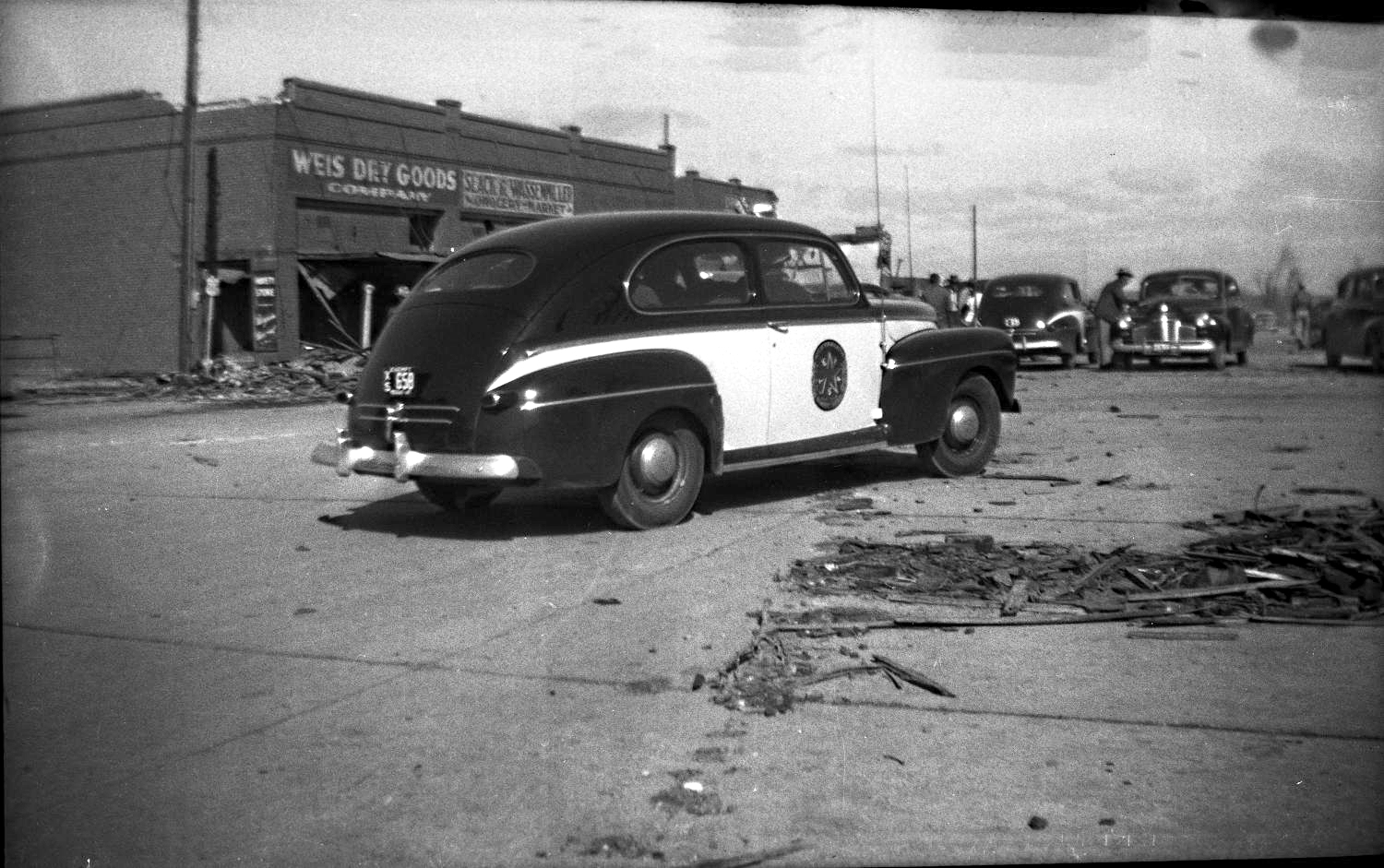 Police Car and Debris in Glazier Texas in 1947