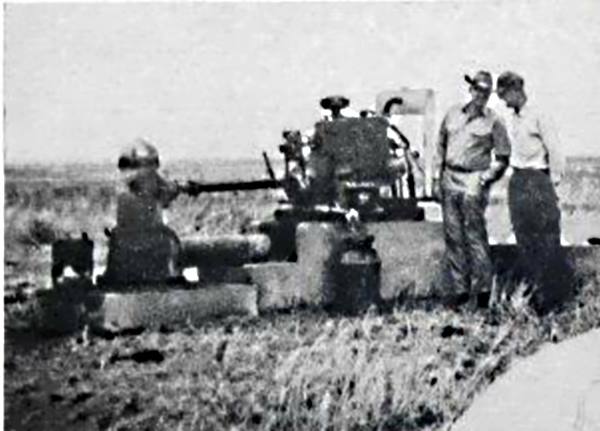 T.C. and Dean Faver on a farm near Littlefield in 1964