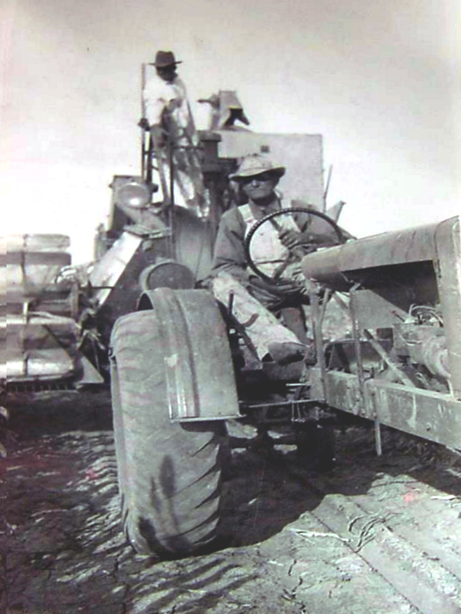 Tractor Powered Combine in 1930s Nolan County