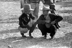 Cowboys talking at horse auction, Eldorado, Tx 1939